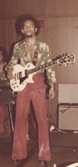 On guitar